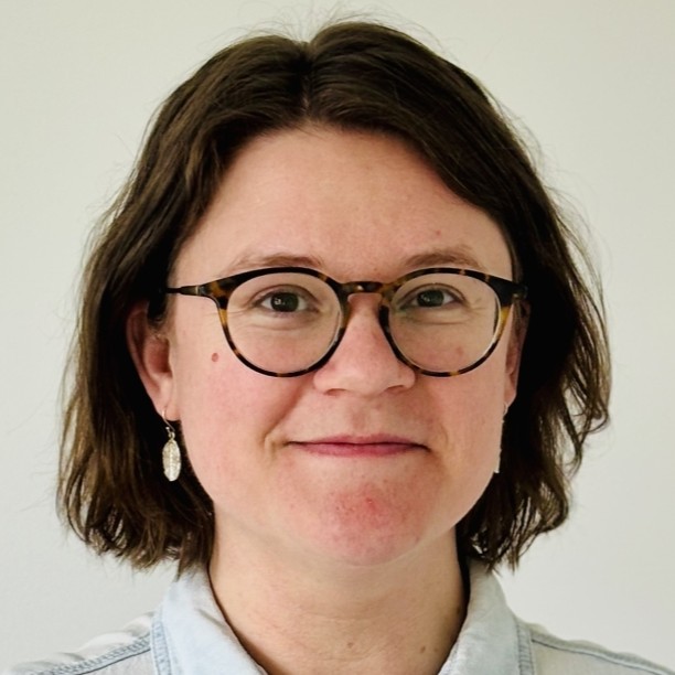 Profile photo of Allie Slemon smiling against a white background.
